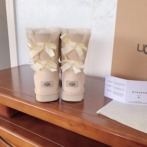 TAN BOW UGGS